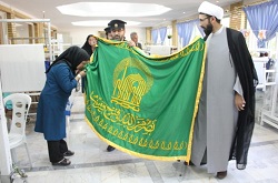پرچم سبز بارگاه ثامن الحجج(ع) در کهریزک